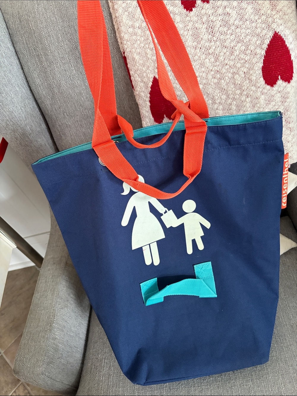Navy Tote Bag with White Mother & Child Graphic and Orange Straps